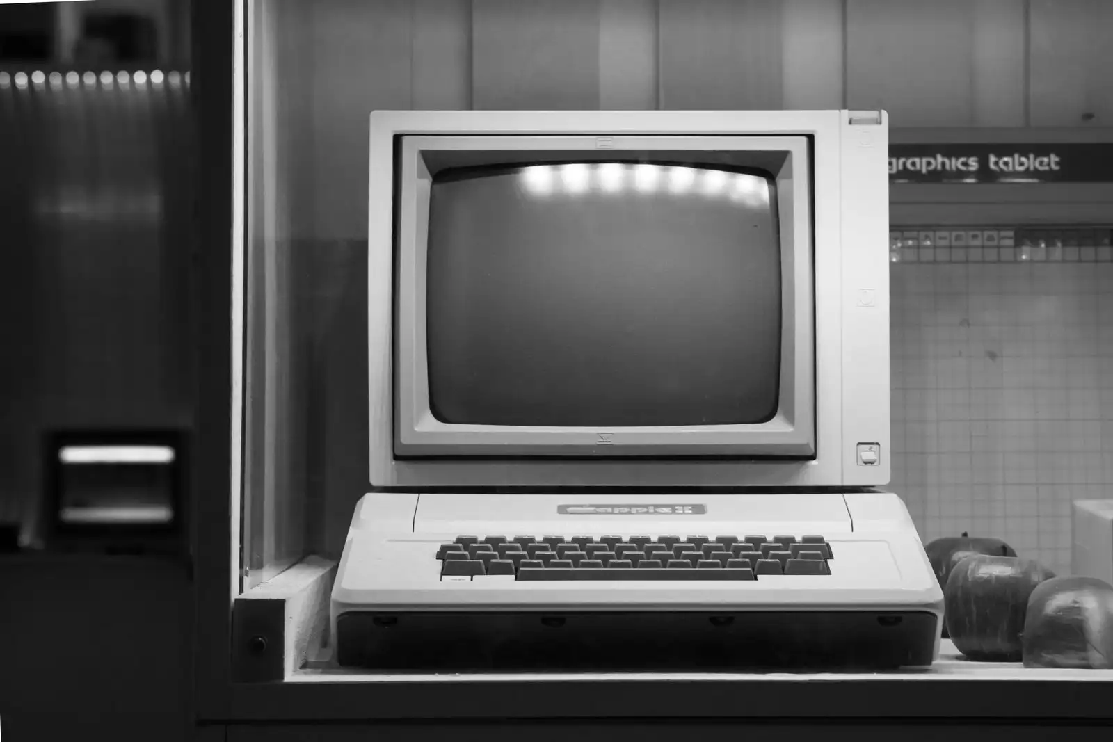 A beige computer terminal from another era, photographed in black and white